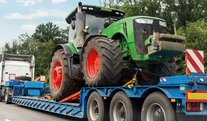 Trailer hauling heavy equipment